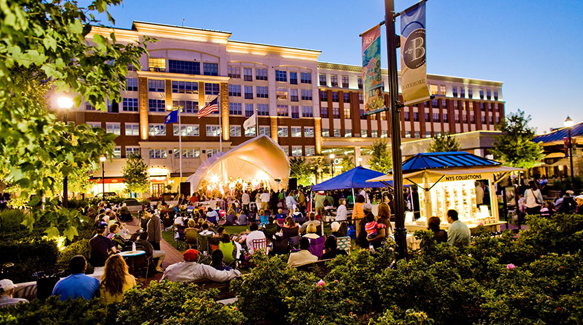 People enjoying live music from lawn seating at Bayshore