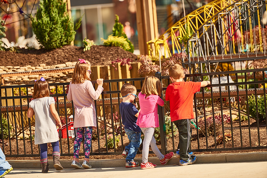 Kids watching a train set at Liberty Center in North Cincinnati