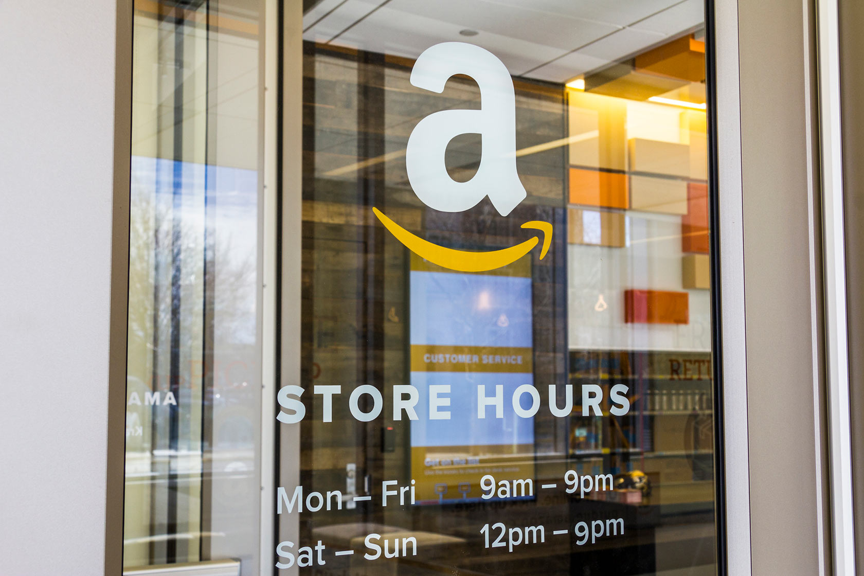 Glass entrance door to Amazon store